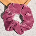 Detail of dark pink velvet scrunchie showing soft texture and glossy fabric ripples - Grape Purple