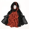 Detail of dual-tone modal hijab scarf in deep black and caramel brown textured fabric - 3# Black + Orange Red
