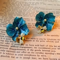 Vintage style blue enamel flower earrings with delicate bee charms and gold plating - Silver Pin Bee Flower Earrings
