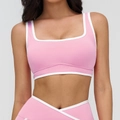 Pink square-neck sports bra with white contrast trim and high-stretch fabric fit - Sakura Pink