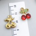 Red crystal cherry pendant in gold finish showing front and back views with scale ruler - Red Rhinestone Cherry (23412)