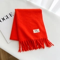 Thick bright orange fringed scarf with woven texture and white minimalist brand label - Pumpkin Orange / Over 175cm