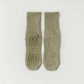Olive green yoga socks with anti-slip silicone dots and ribbed cuffs for women - One Size / Green