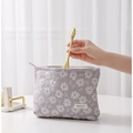 Neceser de lona lavanda con bordado floral blanco y cierre de cremallera metálica - Gris