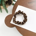 Elegant dark brown satin scrunchie hair tie with high elasticity on a wooden tray - Small / Brown