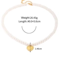 Elegant pearl necklace with golden heart pendant measuring 1.46cm on white background - Pearl Heart Pendant (ft)