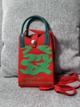 Detailed knit of red mini phone bag featuring green lucky character and shoulder strap - Fortune Character Red