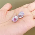 Detailed view of square pink gemstone stud earrings with halo setting and silicone pad - Square Pink Zirconia Clip-on Earrings
