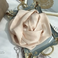 Detail of champagne silk scarf folded into a 3D rose shape on vintage gold frame - 15x150cm / Beige Apricot