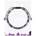 Detailed view of handmade Amethyst beaded bracelet on informative healing card - Amethyst