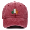 Detailed front view of a washed red vintage baseball cap with Irish shamrock motif - Burgundy