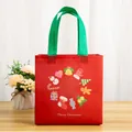 Red Christmas non-woven gift bag with Merry Christmas print and green handles - Christmas Red Style