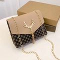 Elegant flap chain crossbody bag with beige lid, gold deer hardware and tassel detail - Apricot Print