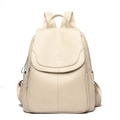 Cream colored faux leather backpack for women with kangaroo pattern and textured finish - White