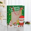 Green Christmas gift bag with transparent window, Santa motifs, and red ribbon handle - Cartoon Santa Claus