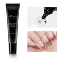 Macro detail of 15ml clear solid nail tips glue being applied to transparent nail tip - 15ml