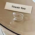 Minimalist double layer silver twisted ring set featuring white pearls in a beige ceramic dish - Silver Double-layer Twisted Rope Pearl