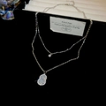 Double-layer necklace with star charm and emerald-style gourd pendant in silver finish - Style 10
