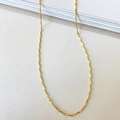 Detailed view of layered gold-tone twist rope chain on a clean white background - Gold Melon Seed Chain