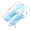 Pinza cortavientos azul de plástico para edredones con resorte metálico reforzado - Azul