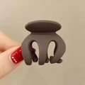 Matte dark brown pumpkin-shaped hair claw clip with a secure interlocking grip - 5cm / Brown