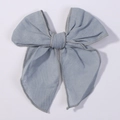 Light blue fabric hair bow clip with grey stitched edges and textured mesh pattern - Fog Blue (2832-106)