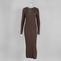 Detail of ribbed knit texture on a long sleeve V-neck brown slim fit maxi dress - S / Brown