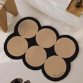 Beige and black circular diatom mud bath mat with GO BATH text for bathroom use - Diatom Mud - Star Circle - Black Coffee