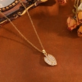 Detail of leaf pendant with pavé crystals on a gold chain in a vintage gift setting - Gold Full Diamond Leaf Style (T029)