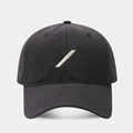 Detailed close-up of a black cotton baseball cap featuring minimalist beige slash embroidery - Adjustable / Dark Gray