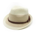 Detail of two-tone straw Panama hat with a woven brown leather band and fine texture - Cream Patchwork