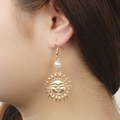 Gold hollow sun face earrings with white pearl detail for women in a stylish design - 01 Asia Gold 7099 (alloy)