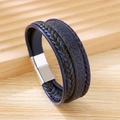 Detail of multi-layer braided leather bracelet with silver magnetic clasp on wood - Dark Blue