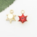 Ciondolo a stella dorato con zircone rosso per orecchini e braccialetti fai da te artigianali - Rosso
