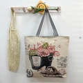 Floral jacquard canvas tote bag with black and white striped straps in cream white - Potted Plant