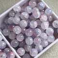 Detail of 10mm faceted glass beads in gradient pink and purple for DIY jewelry making - 10mm / Dreamy Gradient