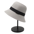 Close-up of light grey woven straw bucket hat featuring a black ribbon bow detail - M(56-58cm) / Gray