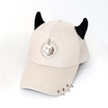 Close-up of beige cotton baseball cap with plush devil horns and silver metal rings - Smiley Face Beige