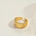 Detail of adjustable gold ring with unique hammered texture and bead edge accents - Hammered Round Style (JZ0429环形捶打款)