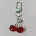 Red resin crystal cherry keychain with silver alloy leaf and lobster clasp on pink background - Silver Hook Red Cherry (Silver Leaf)