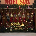 Golden Christmas window stickers featuring Santa Claus and reindeer on a festive glass - Set BQ150-151