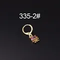 Golden jellyfish earring with pink zircon stone and metallic tentacles on black background - Jellyfish Style (HSPJ335-2#)