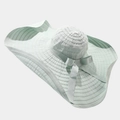 Detail of mint green sun hat with wavy brim, pleated texture, and ribbon bow accent - One Size / Mint Green With Bow