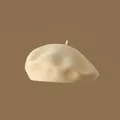 Close-up of a beige wool beret hat with retro pumpkin shape and soft texture - One Size / Apricot
