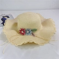 Detail of beige straw hat with red and blue fabric flowers and scalloped lace brim - Adult M (56-58cm) / Beige