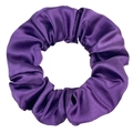 Detail view of glossy bright purple satin scrunchie with smooth silk-like fabric texture - Deep purple