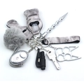 Detailed set featuring tie-dye neoprene pouches, grey pom-pom, and metal utility keychains - Grey Tie Dye