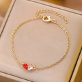 Gold-plated rhinestone bracelet featuring red and pink pear-cut crystals and clasp - Gold Double Pear Shape Gemstone Bracelet (3204)