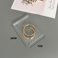 Pair of gold hoop earrings in a 10x7cm transparent PVC self-sealing storage bag - 30 Silk 7x10cm