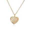 Detailopname van een goudkleurige hartjesketting met sprankelende zirkoniasteentjes - Hart / Goud